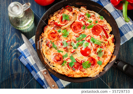 Frittata made of eggs, sausage chorizo Frittata made of eggs, sausage chorizo 35729733