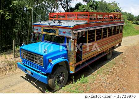 Typical colorful chicken bus near El Jardin 35729970