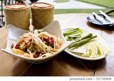 Thai papaya salad call som-tam Thai papaya salad call som-tam 35730909