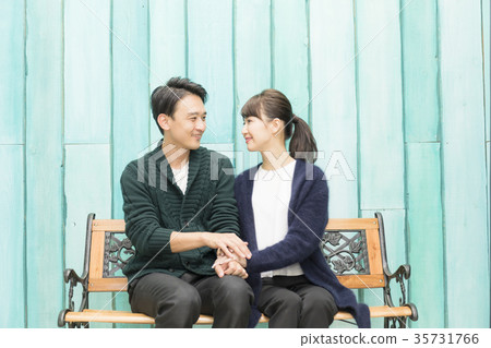 Image of happy couple on a park date 35731766