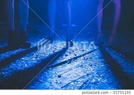 Legs of dancing people at the party. Legs of dancing people at the party. 35735195
