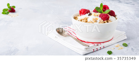 Healthy breakfast with granola and berries 35735349