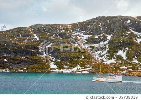 Fishing ship in fjord in Norway Fishing ship in fjord in Norway 35739019
