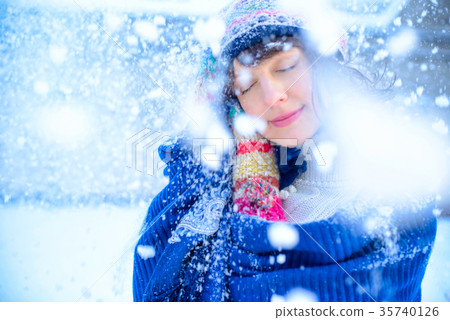 Christmas sale. Beautiful surprised woman in red Christmas sale. Beautiful surprised woman in red 35740126