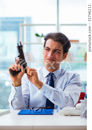 Angry businessman with gun thinking of committing 35746211