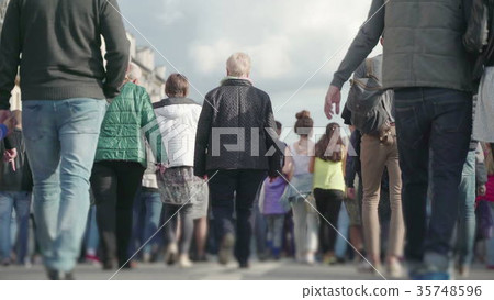 Concept of crowd unrecognizable people walking on 35748596