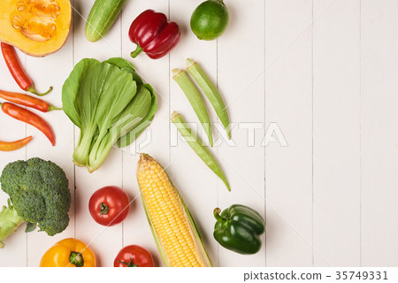 Assortment of the fresh vegetables on wooden Assortment of the fresh vegetables on wooden 35749331