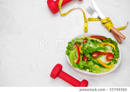 Healthy fitness meal with fresh salad Diet concept 35749360