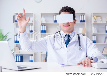 Young doctor with vr virtual reality headset 35749555