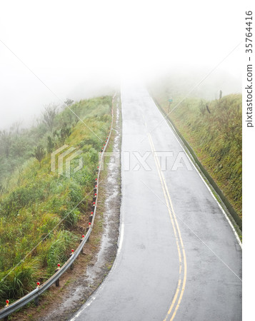 Mountain road in the fog Mountain road in the fog 35764416