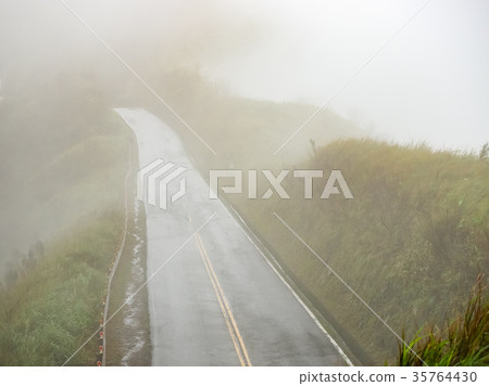 Mountain road in the fog Mountain road in the fog 35764430