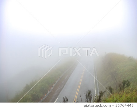 Mountain road in the fog Mountain road in the fog 35764445