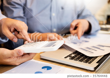 Team work process. young business managers crew working with new Team work process. young business managers crew working with new 35764448