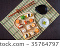 Sushi with salmon. 35764797