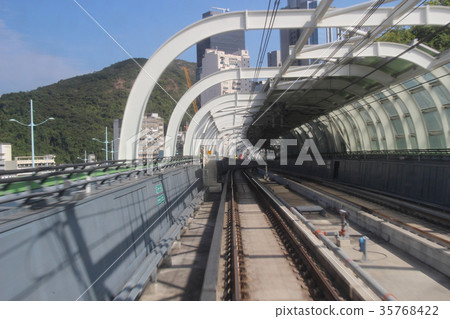 Monorail passing though the tunnel 35768422