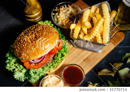 Tasty american beef burger with grilled meat Tasty american beef burger with grilled meat 35770714