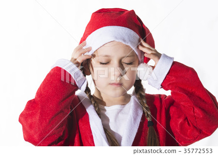 Little caucasian girl dressed as Santa Claus. 35772553