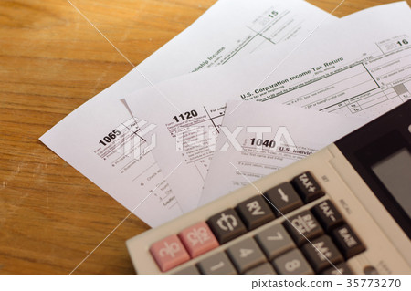 US tax form with pen taxation concept US tax form with pen taxation concept 35773270