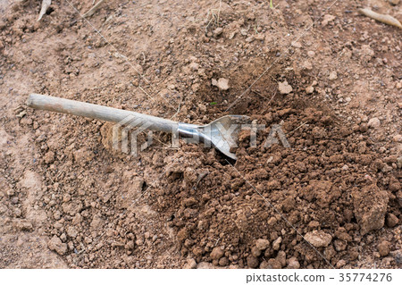 Shovel in the soil Shovel in the soil 35774276