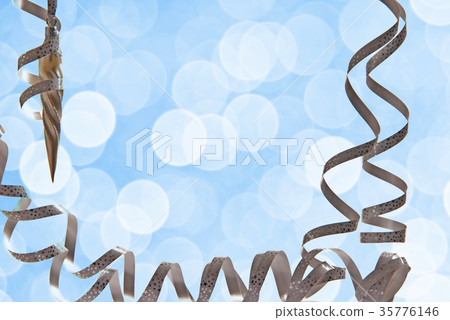 Blue christmas background with a silver ribbon Blue christmas background with a silver ribbon 35776146