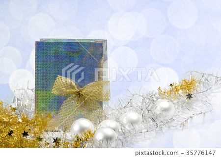 Silver bag with christmas present Silver bag with christmas present 35776147