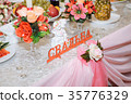 wedding table decorations. Flowers on vase on 35776329