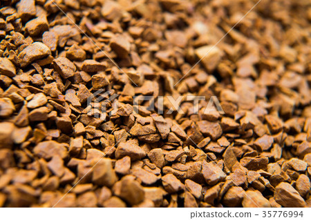 Pile of instant coffee grains background close up Pile of instant coffee grains background close up 35776994