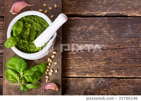 pesto sauce with ingredients for cooking 35780146