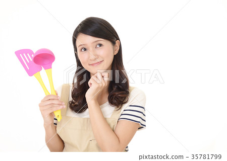 Housewife who enjoys cooking 35781799