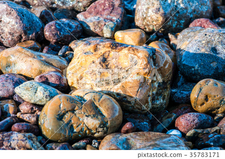 pebbles in the shore 35783171