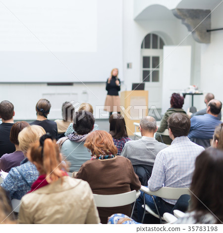 Woman giving presentation on business conference. 35783198