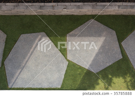 Texture or pattern of paving walkway. 35785888