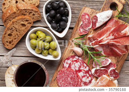 Salami, ham, sausage, prosciutto and wine 35790188