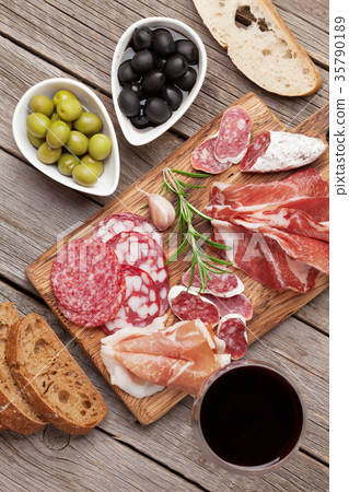 Salami, ham, sausage, prosciutto and wine Salami, ham, sausage, prosciutto and wine 35790189
