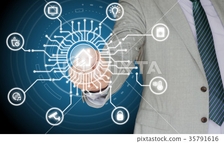 IT expert touching the center of a circuit with a IT expert touching the center of a circuit with a 35791616