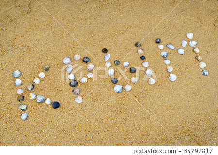Word "Crimea" in russian built of shells on sand 35792817