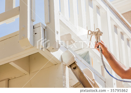 Professional House Painter Wearing Facial Protection Spray Paint 35795862