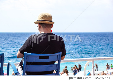 relaxation on the beach, young man enjoying relaxation on the beach, young man enjoying 35797464