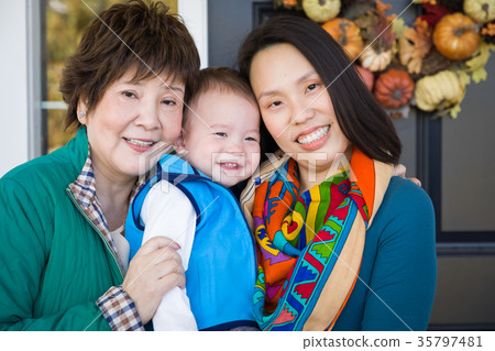 Chinese Senior Grandmother with Daughter and Gra Chinese Senior Grandmother with Daughter and Gra 35797481