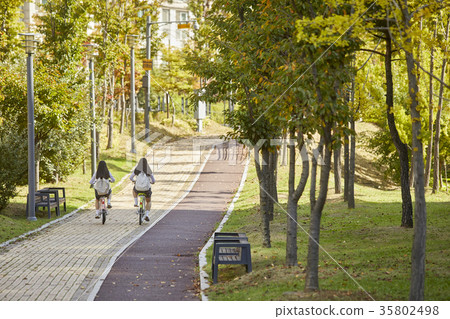 High school student, bicycle, park High school student, bicycle, park 35802498