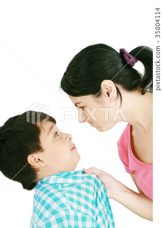 Boy confronts his mother isolated on white Boy confronts his mother isolated on white 35804114