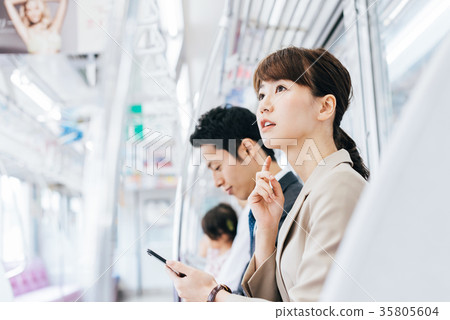 Business Woman Train photography cooperation-Keio Electric Railway Co., Ltd. Business Woman Train photography cooperation-Keio Electric Railway Co., Ltd. 35805604