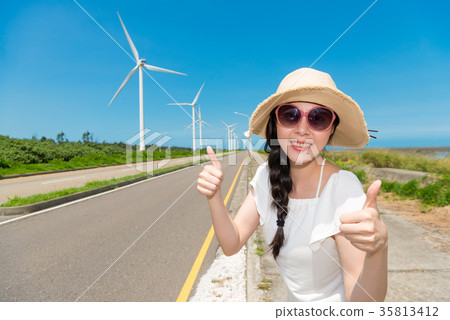 happy Asian woman makes a thumbs up 35813412