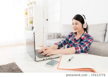 female university student typing mobile computer female university student typing mobile computer 35813778