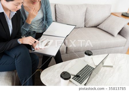 high angle view photo of female insurance agent 35813785