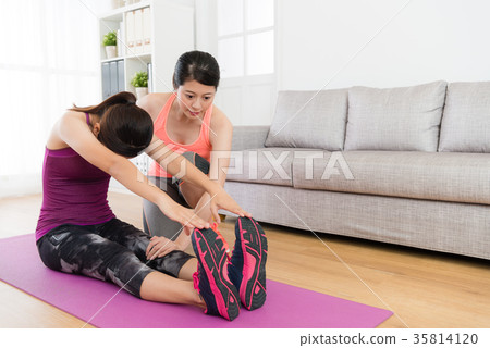 young beautiful female student stretching body young beautiful female student stretching body 35814120