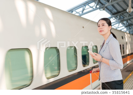 Asian woman waiting for her train arrival 35815641