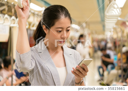 Asian office lady reading news information 35815661