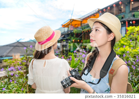 two Asian girls visiting the famous landmarks two Asian girls visiting the famous landmarks 35816021