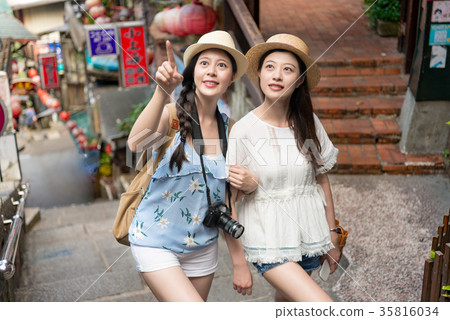 Asian girls walking on hill street stair 35816034